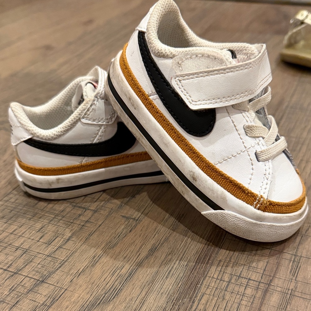 Nike Kids White, Black, and Gold Sneakers